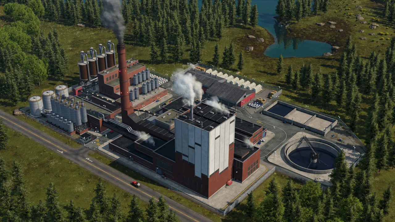An industrial plant with a tall chimney and white steam beside a lake surrounded by pine forest