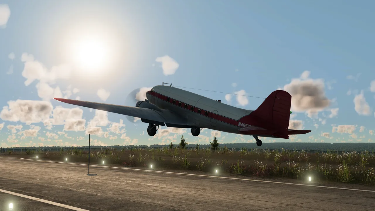 A twin-engine propeller airliner with a red tail taking off from a runway