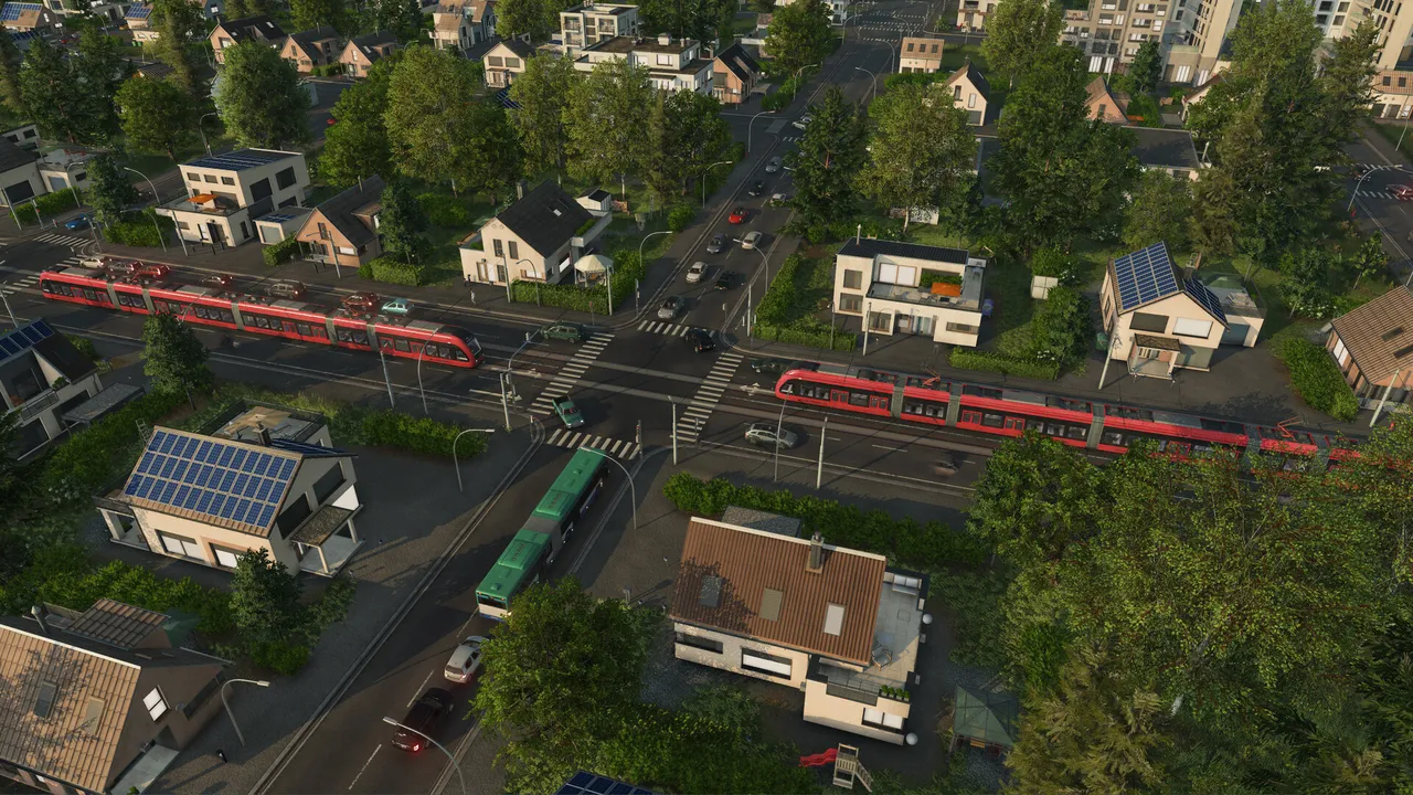 Red trams running on a median track through a suburb, with a green bus at a crossing